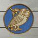 Chevron with the image of the "Athenian Owl"
